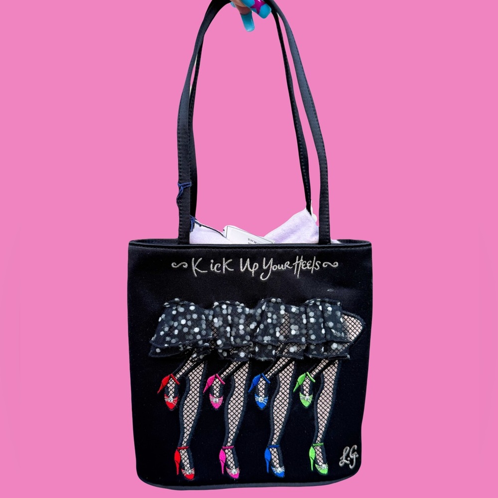 “Kick up your heels” Lulu Guinness top handle bag!